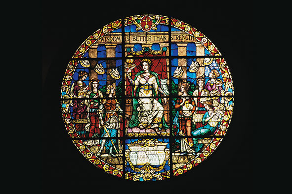 Befitting a liberal arts college chapel, wisdom is the theme of this great circular window, which resides over the chapel's rear gallery.