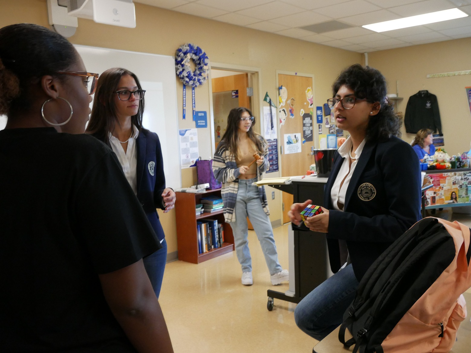 Jiya Manchanda and Anna Haber discusses standardized tests and college applications with students at Apopka High School