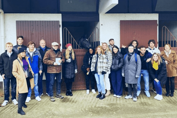 Immerse yourself in business and culture like this Rollins group visiting the Pau Hippodrome in France.