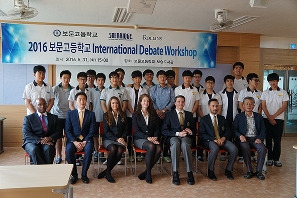 Rollins Debate Team hosts a debating seminar at an all boys school in South Korea