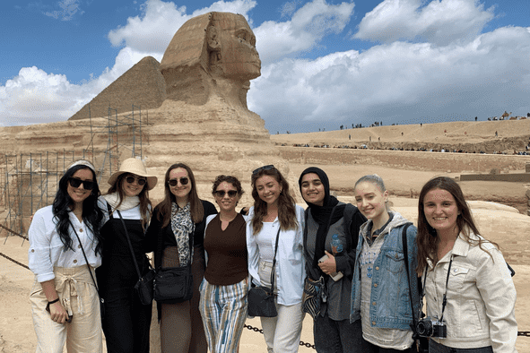 Engage with history and culture like these Rollins students visiting the Great Sphinx of Giza in Egypt.